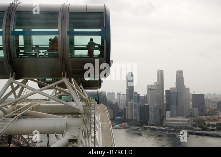 Passengers are seen in a capsule on the Singapore Flyer in Singapore Stock Photo