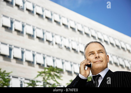 Business man talking on his phone Stock Photo