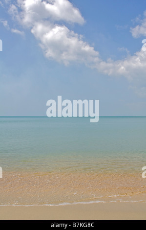 Blue sky and white clouds above crystal clear waters of Lipa Noi beach Koh Samui Thailand Stock Photo