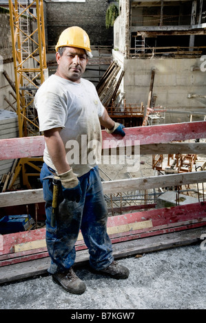 Construction worker at building site Stock Photo