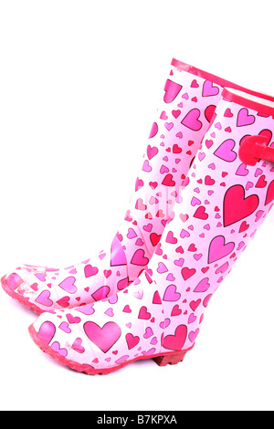 Cutout of a  pair of wellies with pink hearts on them Stock Photo
