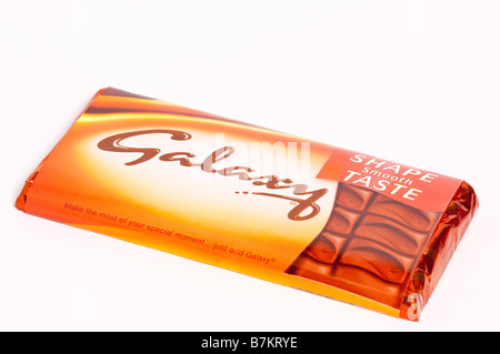 A close up of a bar of Galaxy milk chocolate on a white background Stock Photo