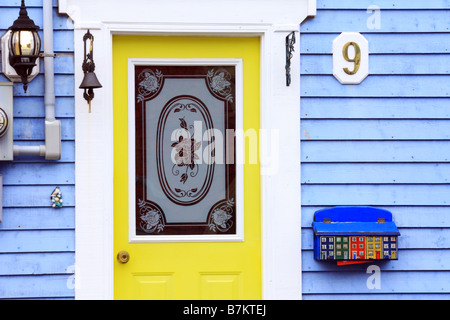 Door and painted mailbox of a rowhouse home in St Johns Newfoundland
