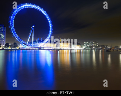 London Eye at night taken from the Victoria Embankment Stock Photo