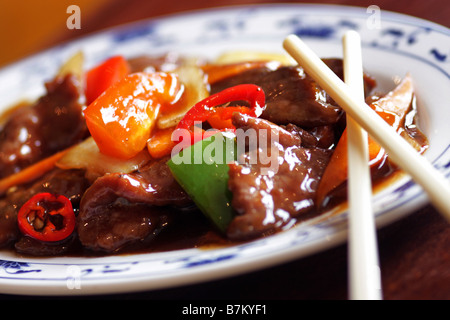 Chinese beef and black bean sauce in a foil take away tray