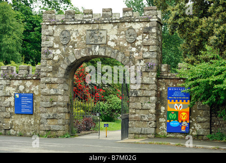 The gates to Muncaster Castle Cumbria home of the Frost Pennington family for over 800 years Stock Photo