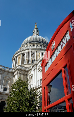 A red telephone booth by St Pauls Cathedral in London Stock Photo
