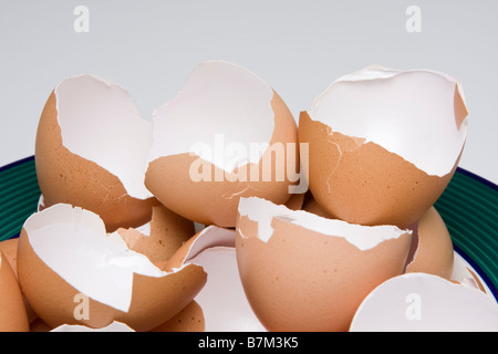 Broken eggshells in a bowl Stock Photo