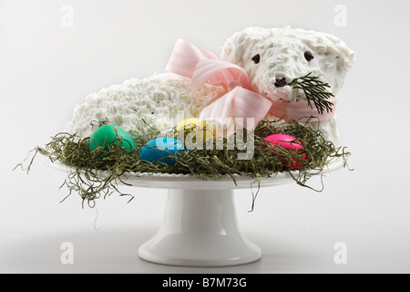 The Easter Holiday a traditional sweet lamb cake with the colored eggs pictures images photos large high resolution horizontal in USA US hi-res Stock Photo