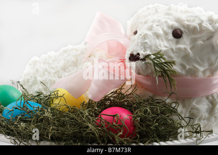 The Easter Holiday a traditional sweet lamb cake with the colored eggs pictures images photos large high resolution horizontal in USA US hi-res Stock Photo