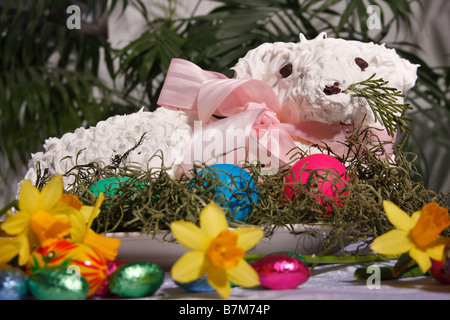 Spring Easter Holiday traditional a lamb cake with colored eggs on a plate close up close up background nobody horizontal in USA US hi-res Stock Photo