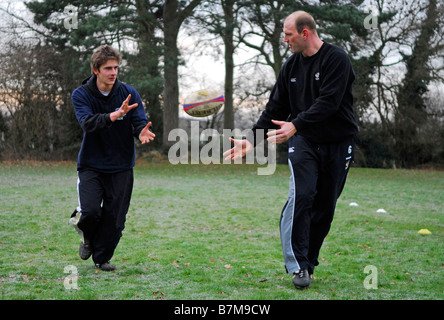 Former Wasps and England rugby star Lawrence Dallaglio (right) leading a training session in Buckinghamshire, UK. Stock Photo