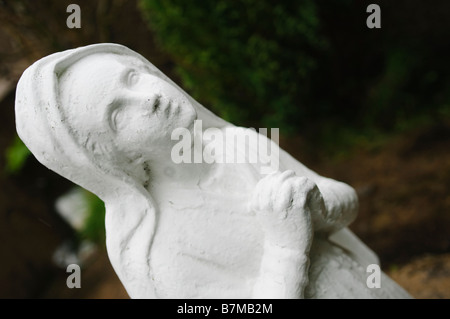 Statue of the Virgin Mary praying at a shrine in Sligo. Stock Photo