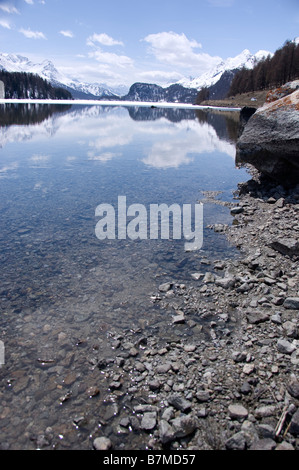 The crystal clear water of Lake Sils in spring.Graubunden. Switzerland Stock Photo