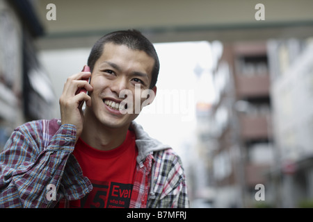 Man on Cell-Phone Smiling Stock Photo