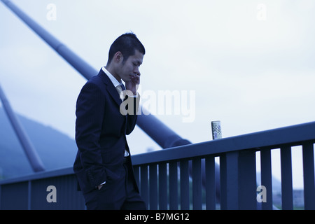 Businessman on Cell-Phone Stock Photo