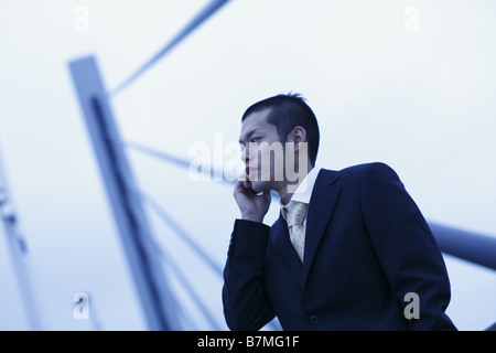 Businessman on Cell-Phone Stock Photo
