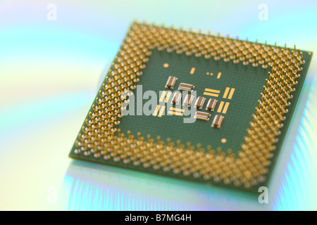 Computer CPU processor chip on green reflective background Stock Photo