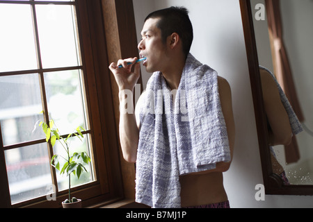 Man Brushing Teeth Stock Photo