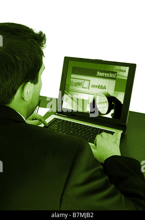 Young  business man working at laptop on white Stock Photo