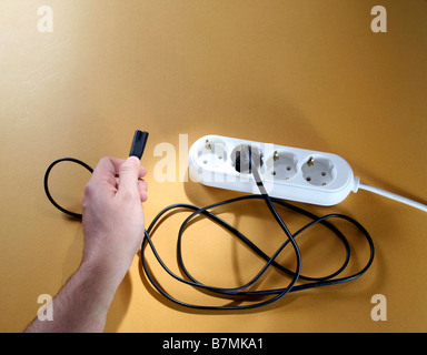 Closeup picture of a white outlet isolated on yellow Stock Photo