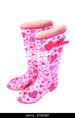 Cutout of a  pair of wellies with pink hearts on them Stock Photo