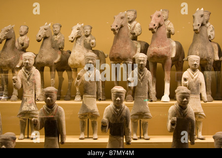 Terracotta figures unearthed from royal tumulus or tomb and on display at the Shaanxi Historical Museum in Xian in China. Stock Photo