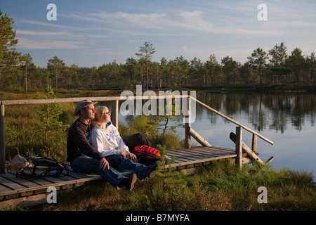 Young Couple on Hiking Trail, Mennikunno Landscape Reserve, Põlva County, Estonia, Europe Stock Photo