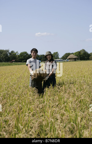 A couple in the rice field Stock Photo