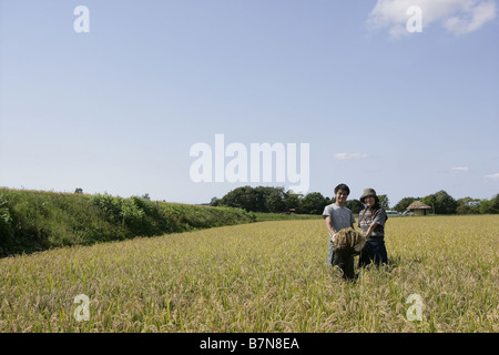 A couple in the rice field Stock Photo