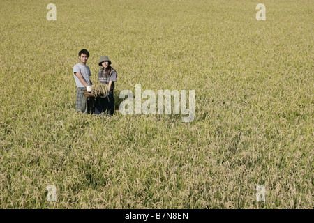 A couple in the rice field Stock Photo