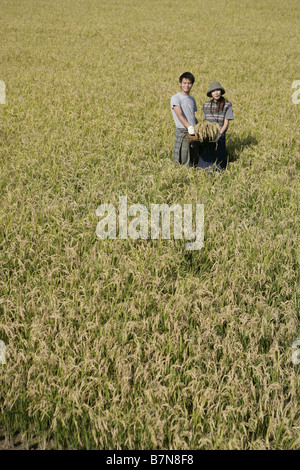 A couple in the rice field Stock Photo