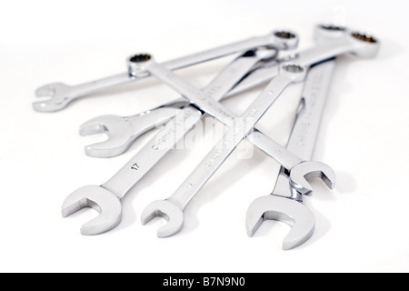 Group of six spanners on a white background Stock Photo