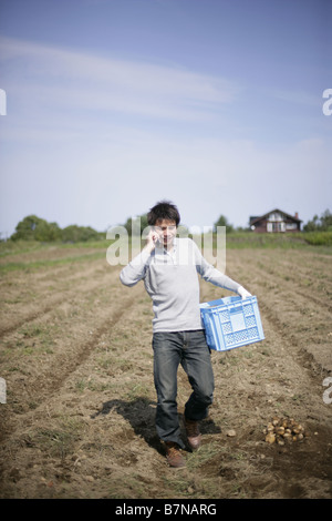 A man calling in the farm Stock Photo