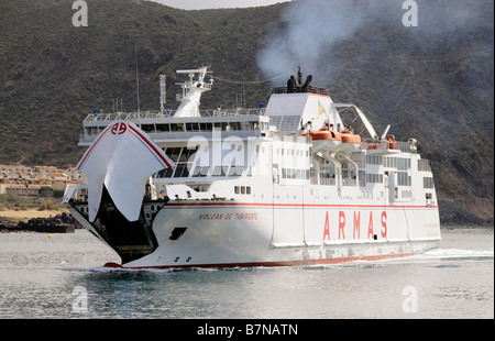 Roro inter island ferry arriving in port with bow door open Los Cristianos port Tenerife Canary Islands Stock Photo