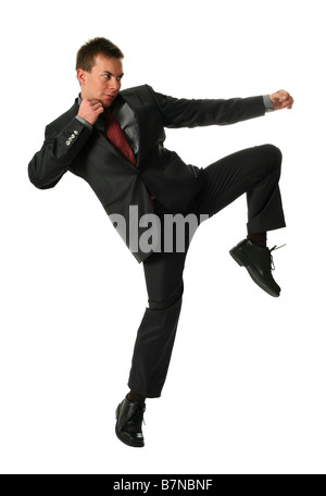 Fighting young businessman isolated on white Stock Photo