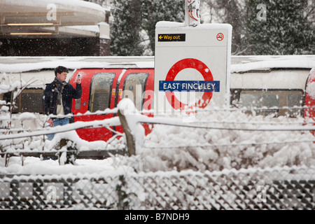 Snow continues to fall at East Finchley Underground Station north London on the 2nd of February 2009 Stock Photo