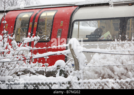 Snow continues to fall at East Finchley Underground Station north London on the 2nd of February 2009 Stock Photo