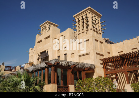 Buildings with Traditional Arabic Wind Towers in Dubai Stock Photo