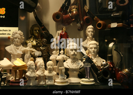 Busts of Mozart, Strauss and Beethoven in a souvenir shop window in the historic centre of Salzburg, Austria. Stock Photo