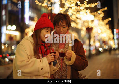 Couple drinking hot wine Stock Photo