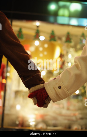 Couple holding hands Stock Photo