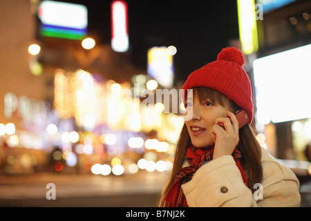 Woman talking on cell phone Stock Photo