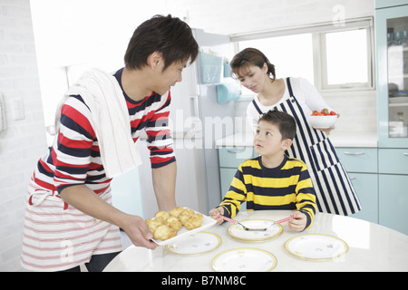 Family preparing sweets Stock Photo