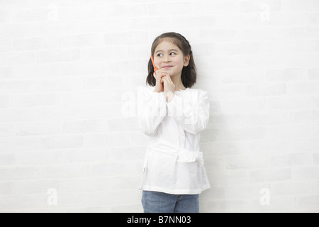 A girl using mobile phones Stock Photo