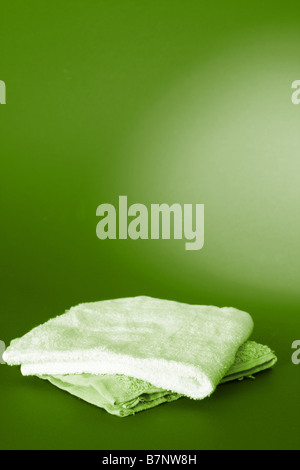 Towels isolated on red background Stock Photo