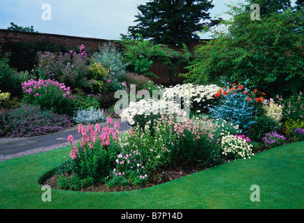 Pink and white flowering summer border at Holehird Gardens Stock Photo