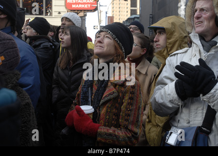 Thousands of people gather in Times Square in New York on Tuesday January 20 2009 to watch the inauguration of Barack Obama Stock Photo