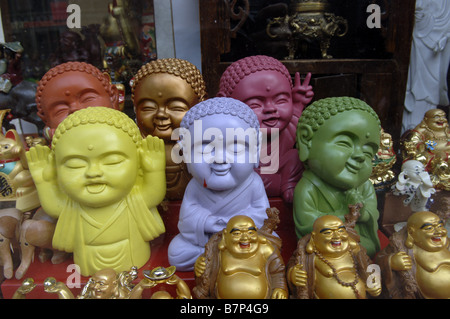 Buddha souvenirs are sold in New York City s Chinatown during Chinese New Year Stock Photo