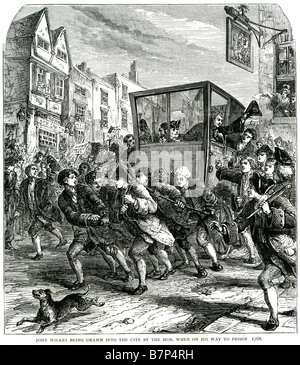 john wilkes being drawn into city mob prison 1768 English radical journalist and politician Stock Photo